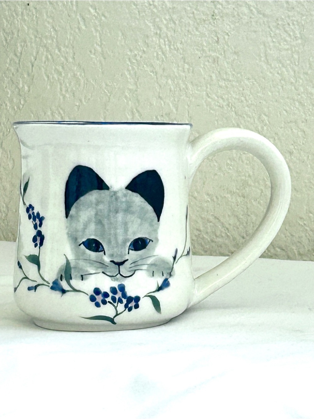 White Ceramic Cat Mug with Blue Floral Accents